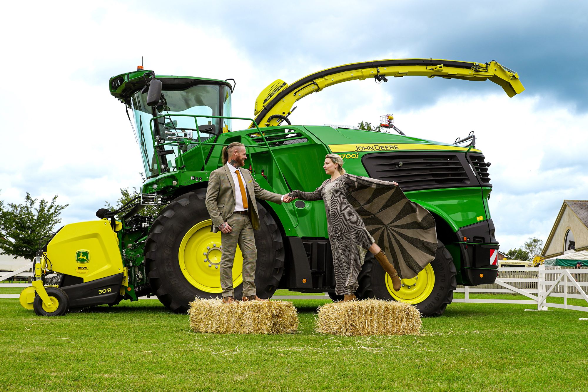 Great-Yorkshire-Show-Sheep-to-Chic-catwalk-models-Luke-Johnson-and-Lizzie-McLaughlin-with-the-John-Deere-9700-Forage-Harvester.