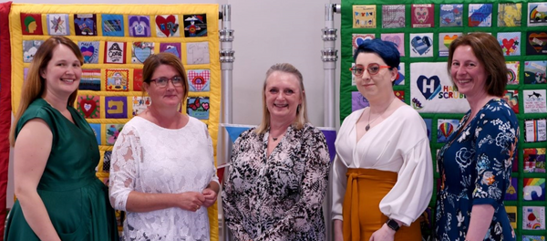 Harrogate Scrubbers celebrate memory quilts